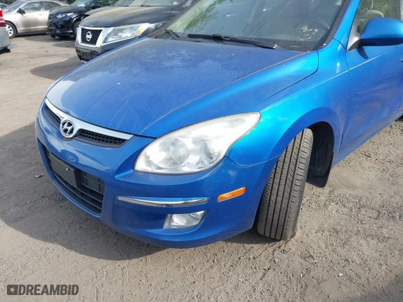 2010 Hyundai Elantra Touring SE with VIN KMHDC8AE0AU052512, listed as a IAAI auction lot 42123818 with 243,070 mi miles. Bid and sale history available at carsss.com. Image 6.