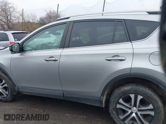 2018 Toyota RAV4 LE with VIN 2T3BFREVXJW717079, listed as a IAAI auction lot 42001580 with 96,044 mi miles. Bid and sale history available at carsss.com. Image 14.