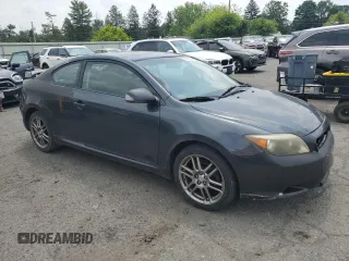 2006 Scion tC z VIN JTKDE177X60123771, wystawiony jako Copart lot #59763245 z przebiegiem 231 959 mil mil oraz Szkoda całkowita • Salvage title. Historia ofert i sprzedaży dostępna na DreamBid. Obrazek 4.