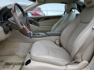 2009 Mercedes-Benz SL 550 with VIN WDBSK71F49F143492, listed as a Copart auction lot 88757425 with 89,117 mi miles and Salvage title. Bid and sale history available at DreamBid. Image 7.