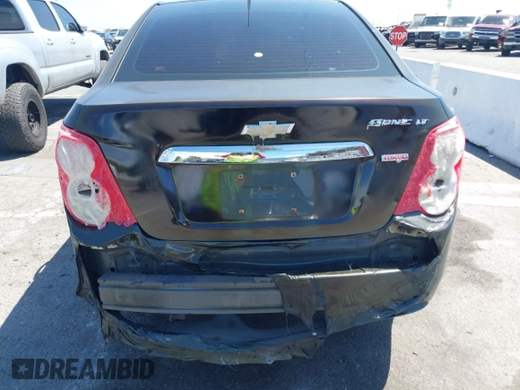 2014 Chevrolet Sonic LT with VIN 1G1JC5SB7E4146444, listed as a IAAI auction lot 42014386 with 85,122 mi miles and . Bid and sale history available at DreamBid. Image 6.