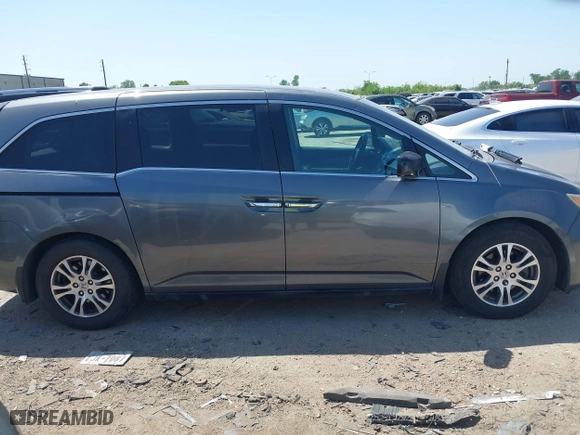 2012 Honda Odyssey EX with VIN 5FNRL5H49CB139262, listed as a IAAI auction lot 42024256 with 124,695 mi miles. Bid and sale history available at carsss.com. Image 13.