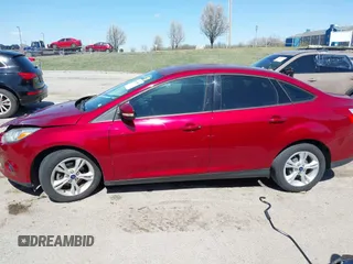 2013 Ford Focus SE with VIN 1FADP3F21DL241017, listed as a IAAI auction lot 41825092 with 101,833 mi miles and . Bid and sale history available at DreamBid. Image 14.