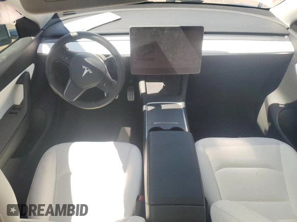 2022 Tesla Model Y Performance with VIN 7SAYGDEF9NF372337, listed as a Copart auction lot 55889345 with 51,099 mi miles and Salvage title. Bid and sale history available at DreamBid. Image 8.