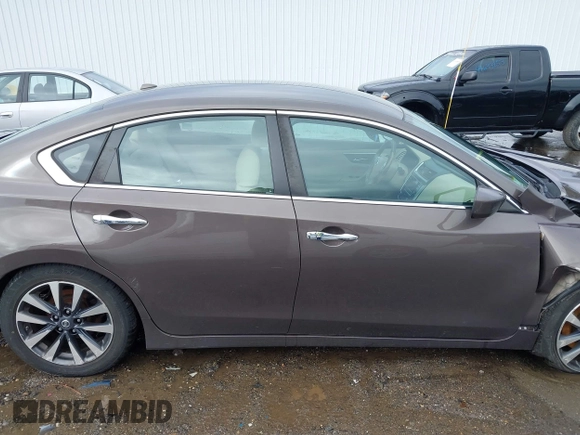 2016 Nissan Altima S with VIN 1N4AL3APXGC266407, listed as a IAAI auction lot 41727634 with 127,936 mi miles and . Bid and sale history available at DreamBid. Image 14.