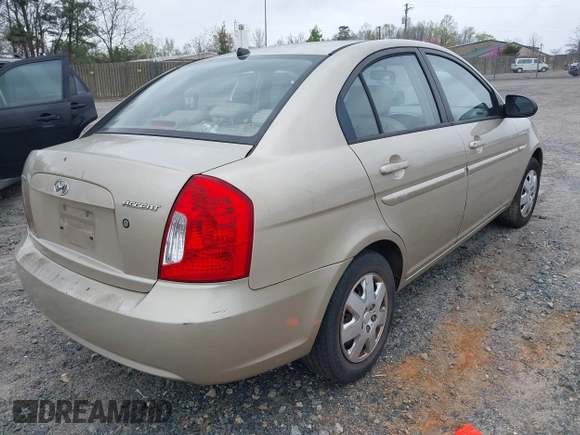 2006 Hyundai Accent GLS z VIN KMHCN46C66U058232, wystawiony jako IAAI lot #41899629 z przebiegiem 182 669 mil mil oraz . Historia ofert i sprzedaży dostępna na DreamBid. Obrazek 4.
