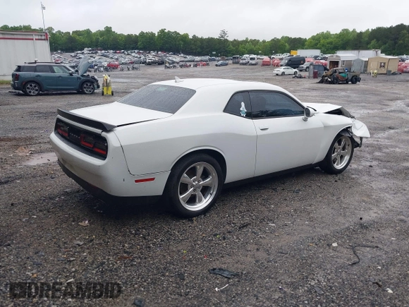 2015 Dodge Challenger SXT with VIN 2C3CDZAG2FH701634, listed as a IAAI auction lot 42242521 with 153,379 mi miles and . Bid and sale history available at DreamBid. Image 4.