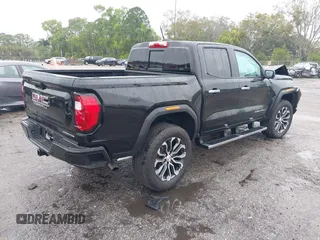 2024 GMC Canyon 4WD Denali with VIN 1GTP6FEK8R1133039, listed as a IAAI auction lot 41398204 with 7,735 mi miles and . Bid and sale history available at carsss.com. Image 4.