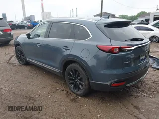 2022 Mazda CX-9 Grand Touring with VIN JM3TCBDY0N0615968, listed as a IAAI auction lot 42312159 with 22,912 mi miles and . Bid and sale history available at DreamBid. Image 3.