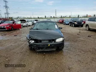 2000 Ford Escort ZX2 z VIN 3FAKP1135YR255974, wystawiony jako Copart lot #69622744 z przebiegiem 97 834 mil mil oraz Szkoda całkowita • Salvage title. Historia ofert i sprzedaży dostępna na DreamBid. Obrazek 11.