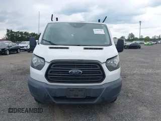 2016 Ford Transit Cargo with VIN 1FTYE1ZM8GKA63622, listed as a IAAI auction lot 41887397 with 153,206 mi miles and . Bid and sale history available at carsss.com. Image 12.