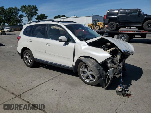 2016 Subaru Forester Touring z VIN JF2SJAXC0GH523611, wystawiony jako Copart lot #57267895 z przebiegiem 145 552 mil mil oraz Szkoda całkowita • Salvage title. Historia ofert i sprzedaży dostępna na DreamBid. Obrazek 4.