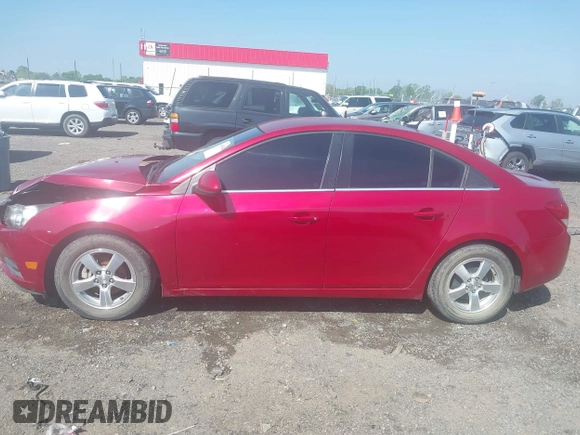 2014 Chevrolet Cruze 1LT z VIN 1G1PC5SB5E7127660, wystawiony jako IAAI lot #41955448 z przebiegiem 163 148 mil mil oraz . Historia ofert i sprzedaży dostępna na DreamBid. Obrazek 14.