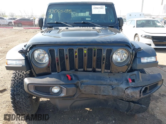 2018 Jeep Wrangler Rubicon z VIN 1C4HJXCG9JW193703, wystawiony jako IAAI lot #42065185 z przebiegiem 61 518 mil mil oraz . Historia ofert i sprzedaży dostępna na DreamBid. Obrazek 6.