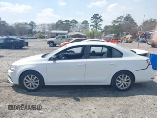 2015 Volkswagen Jetta Sedan 1.8T SE with VIN 3VWD17AJXFM249990, listed as a IAAI auction lot 41810073 with 127,683 mi miles. Bid and sale history available at carsss.com. Image 14.