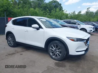 2020 Mazda CX-5 Grand Touring with VIN JM3KFBDM1L0855222, listed as a IAAI auction lot 42288204 with 49,468 mi miles and . Bid and sale history available at DreamBid. Image 1.