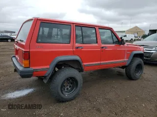 1996 Jeep Cherokee SE z VIN 1J4FJ28S3TL176627, wystawiony jako Copart lot #48173785 z przebiegiem 310 444 mil mil oraz Szkoda całkowita • Salvage title. Historia ofert i sprzedaży dostępna na DreamBid. Obrazek 3.