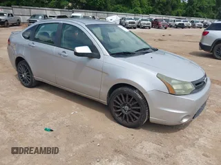 2011 Ford Focus SES with VIN 1FAHP3GN7BW159136, listed as a IAAI auction lot 42126098 with 154,780 mi miles. Bid and sale history available at carsss.com. Image 1.
