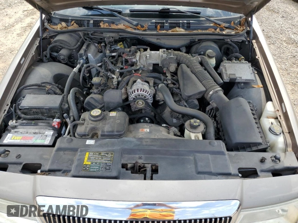 2005 Mercury Grand Marquis LS Premium z VIN 2MEFM75W65X609038, wystawiony jako Copart lot #55766005 z przebiegiem 132 136 mil mil oraz Szkoda całkowita • Salvage title. Historia ofert i sprzedaży dostępna na DreamBid. Obrazek 11.