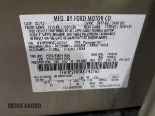 2012 Ford Taurus Limited with VIN 1FAHP2JW3CG142762, listed as a Copart auction lot 77864584 with 131,911 mi miles and Salvage title. Bid and sale history available at DreamBid. Image 12.