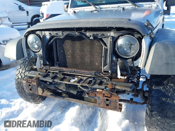 2008 Jeep Wrangler Unlimited Rubicon with VIN 1J4GA69198L615547, listed as a IAAI auction lot 41351138 with 213,487 mi miles and . Bid and sale history available at DreamBid. Image 6.