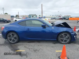 2015 Scion FR-S z VIN JF1ZNAA11F8709669, wystawiony jako IAAI lot #41794094 z przebiegiem 109 940 mil mil oraz . Historia ofert i sprzedaży dostępna na DreamBid. Obrazek 13.