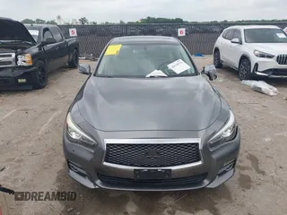 2015 Infiniti Q50 Premium z VIN JN1BV7AR9FM413801, wystawiony jako IAAI lot #42134770 z przebiegiem 111 367 mil mil oraz . Historia ofert i sprzedaży dostępna na DreamBid. Obrazek 12.