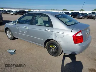 2005 Kia Spectra LX z VIN KNAFE121855141204, wystawiony jako IAAI lot #42443993 z przebiegiem 142 359 mil mil oraz . Historia ofert i sprzedaży dostępna na DreamBid. Obrazek 3.