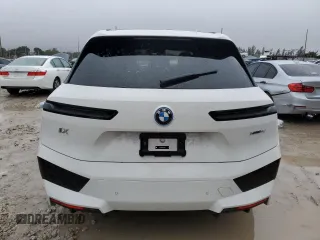 2025 BMW iX xDrive50 with VIN WB523CF03SCT45934, listed as a Copart auction lot 41925155 with 4,106 mi miles and Salvage Title. Bid and sale history available at carsss.com. Image 6.