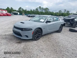 2022 Dodge Charger R/T with VIN 2C3CDXCTXNH240387, listed as a IAAI auction lot 42471923 with 66,616 mi miles and . Bid and sale history available at DreamBid. Image 2.