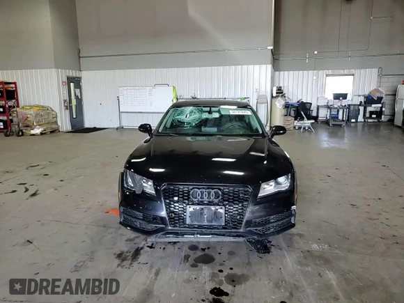 2014 Audi A7 Premium Plus z VIN WAUWGAFC2EN082639, wystawiony jako Copart lot #50797845 z przebiegiem 181 685 mil mil oraz Szkody całkowita. Historia ofert i sprzedaży dostępna na DreamBid. Obrazek 11.