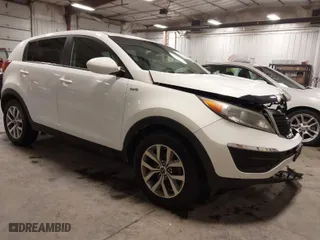 2014 Kia Sportage LX with VIN KNDPBCAC2E7559986, listed as a IAAI auction lot 41830084 with 166,837 mi miles. Bid and sale history available at carsss.com. Image 1.
