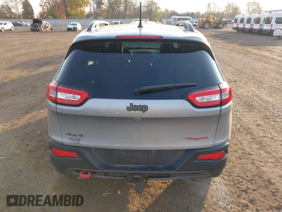 2015 Jeep Cherokee Trailhawk z VIN 1C4PJMBS2FW728961, wystawiony jako IAAI lot #40712830 z przebiegiem 79 299 mil mil oraz . Historia ofert i sprzedaży dostępna na DreamBid. Obrazek 16.