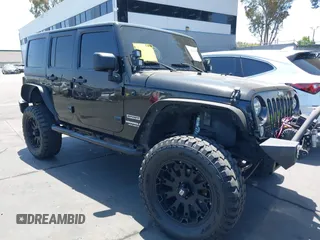 2015 Jeep Wrangler Unlimited Sport with VIN 1C4HJWDG7FL544447, listed as a IAAI auction lot 42283613 with 132,939 mi miles and . Bid and sale history available at DreamBid. Image 1.