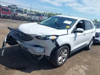 2020 Ford Edge SEL z VIN 2FMPK4J90LBA28960, wystawiony jako IAAI lot #42264189 z przebiegiem 91 312 mil mil oraz . Historia ofert i sprzedaży dostępna na DreamBid. Obrazek 17.