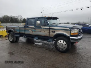 1996 Ford F-350 with VIN 1FTJW35F5TEB52509, listed as a Copart auction lot 51048475 with 199,464 mi miles and Salvage Title. Bid and sale history available at DreamBid. Image 4.
