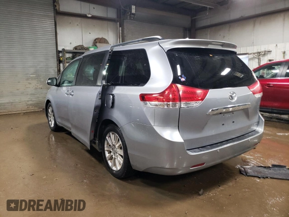2011 Toyota Sienna XLE AAS with VIN 5TDYK3DC0BS174864, listed as a Copart auction lot 50387005 with 218,938 mi miles and Salvage Title. Bid and sale history available at DreamBid. Image 2.