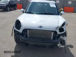 2016 MINI Countryman S with VIN WMWZC5C57GWU22015, listed as a IAAI auction lot 41806547 with 65,124 mi miles and . Bid and sale history available at DreamBid. Image 13.