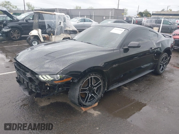 2021 Ford Mustang GT z VIN 1FA6P8CF3M5154673, wystawiony jako IAAI lot #41933201 z przebiegiem 53 757 mil mil oraz . Historia ofert i sprzedaży dostępna na DreamBid. Obrazek 21.