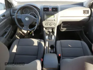 2009 Volkswagen Rabbit S with VIN WVWDB71K89W040860, listed as a Copart auction lot 73996744 with 118,450 mi miles and Salvage Title. Bid and sale history available at carsss.com. Image 8.
