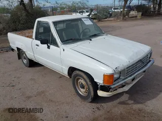 1991 Toyota Pickup DX with VIN JT4RN81P8M5123864, listed as a IAAI auction lot 38084991 with 319,627 mi miles and . Bid and sale history available at DreamBid. Image 1.