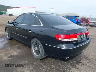 2007 Hyundai Azera SE with VIN KMHFC46F67A186034, listed as a IAAI auction lot 39181735 with 128,930 mi miles. Bid and sale history available at carsss.com. Image 3.