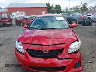 2009 Toyota Corolla with VIN 2T1BU40E09C170961, listed as a IAAI auction lot 42033860 with 192,899 mi miles and . Bid and sale history available at DreamBid. Image 12.
