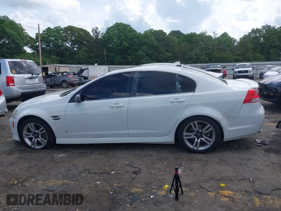 2009 Pontiac G8 z VIN 6G2ER57709L194771, wystawiony jako IAAI lot #42177663 z przebiegiem 249 066 mil mil oraz . Historia ofert i sprzedaży dostępna na DreamBid. Obrazek 14.