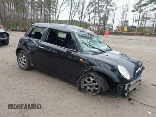 2005 MINI Hardtop with VIN WMWRC33445TJ64482, listed as a IAAI auction lot 41798048 with 115,656 mi miles and . Bid and sale history available at DreamBid. Image 1.