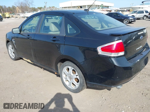 2008 Ford Focus SE with VIN 1FAHP35N68W278579, listed as a IAAI auction lot 41801538 with 999,999 mi miles. Bid and sale history available at carsss.com. Image 3.