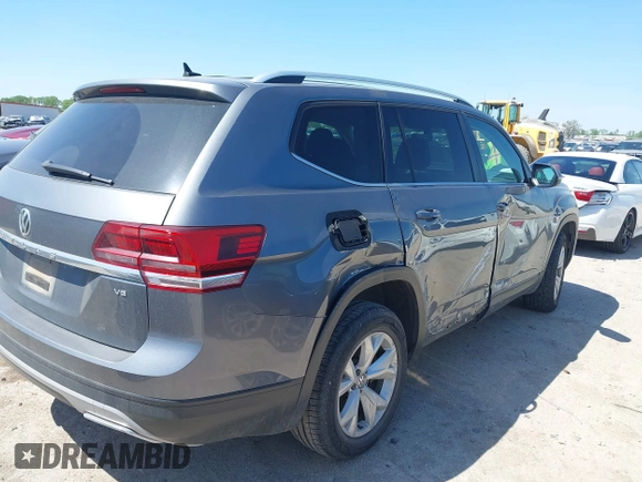 2018 Volkswagen Atlas SE with VIN 1V2CR2CA2JC576397, listed as a IAAI auction lot 41959708 with 168,619 mi miles and . Bid and sale history available at DreamBid. Image 4.