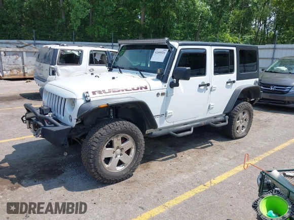 2015 Jeep Wrangler Unlimited Rubicon z VIN 1C4BJWFGXFL755810, wystawiony jako IAAI lot #42495531 z przebiegiem 109 668 mil mil oraz . Historia ofert i sprzedaży dostępna na DreamBid. Obrazek 19.