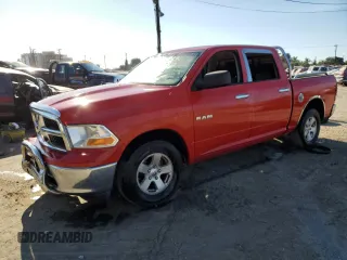 2009 Dodge 1500 SLT with VIN 1D3HB13P09J523691, listed as a Copart auction lot 77484554 with 164,949 mi miles and Salvage Title. Bid and sale history available at DreamBid. Image 1.