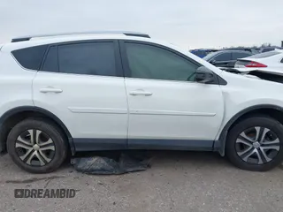 2017 Toyota RAV4 LE with VIN JTMZFREV1HJ103223, listed as a IAAI auction lot 41571466 with 96,860 mi miles and . Bid and sale history available at carsss.com. Image 13.